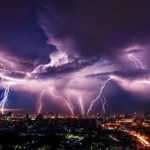 How do electromagnetic waves from lightning affect living cells?