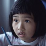 Children improve writing skills by correcting robots