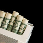 How much money do smokers spend on cigarettes?
